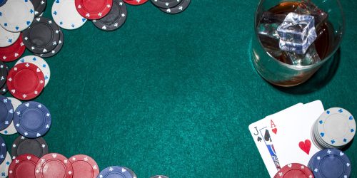 whisky-with-ice-cubes-casino-chips-playing-card-green-poker-table whisky-with-ice-cubes-casino-chips-playing-card-green-poker-table